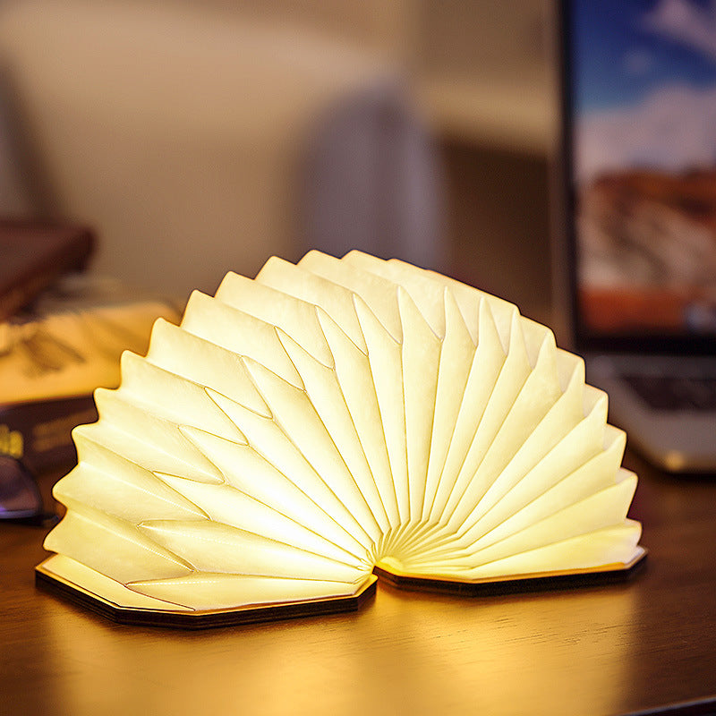 Accordion lamp folded flat showing wood cover